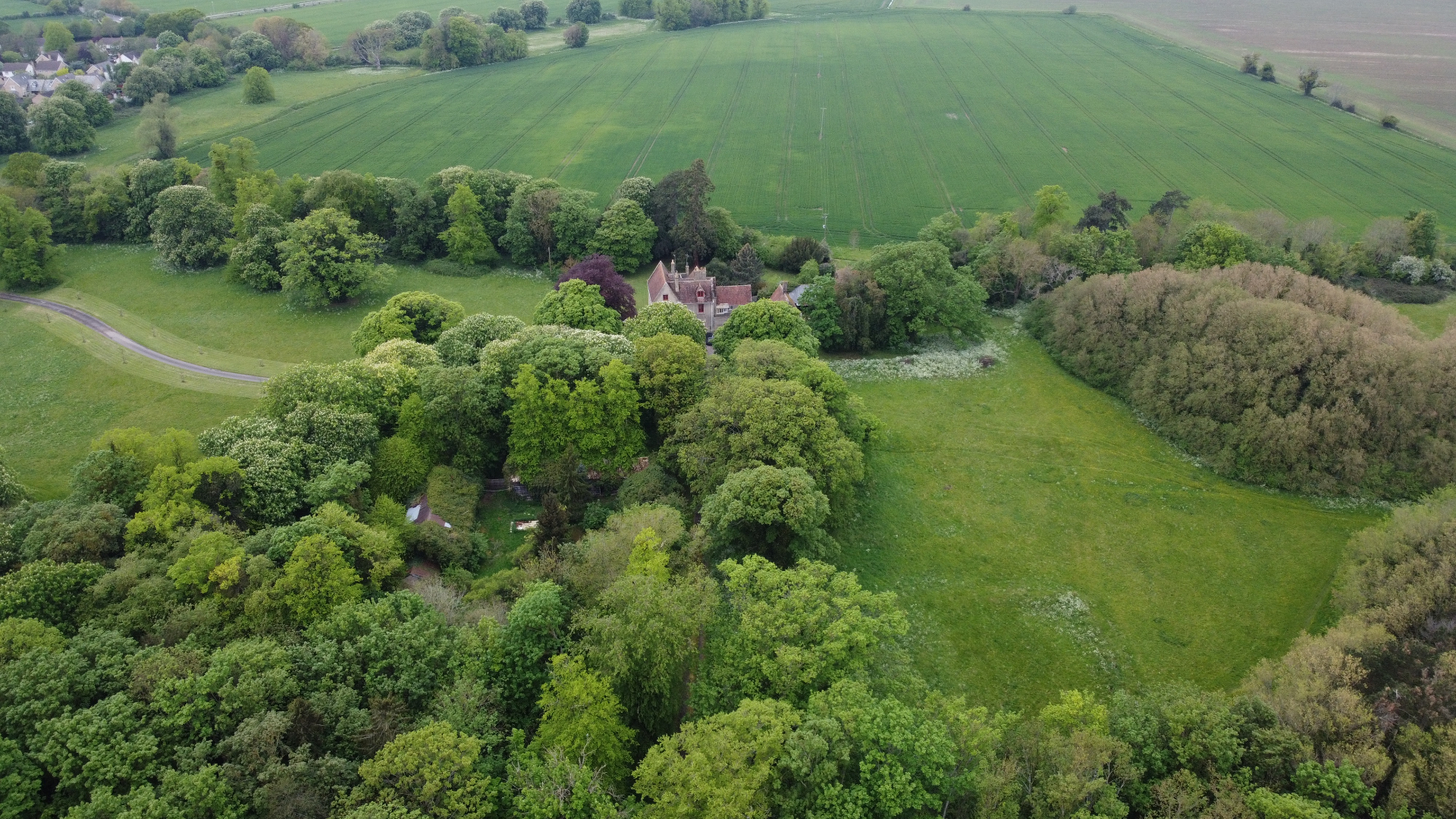 Aerial view of the overgrown courtyard at Abbey Farm